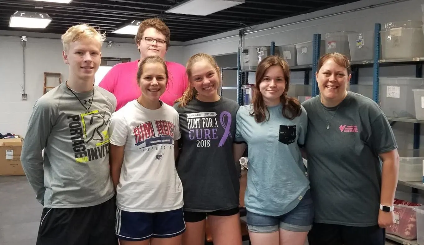 A visiting church work crew volunteering at Seek And Find