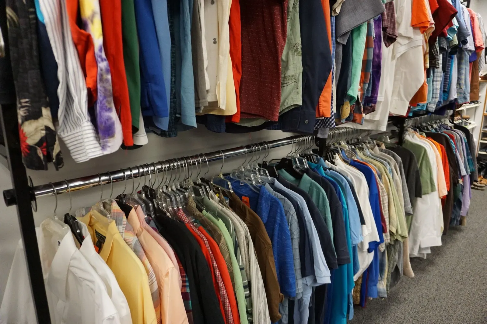 Men's shirts along the clothing racks