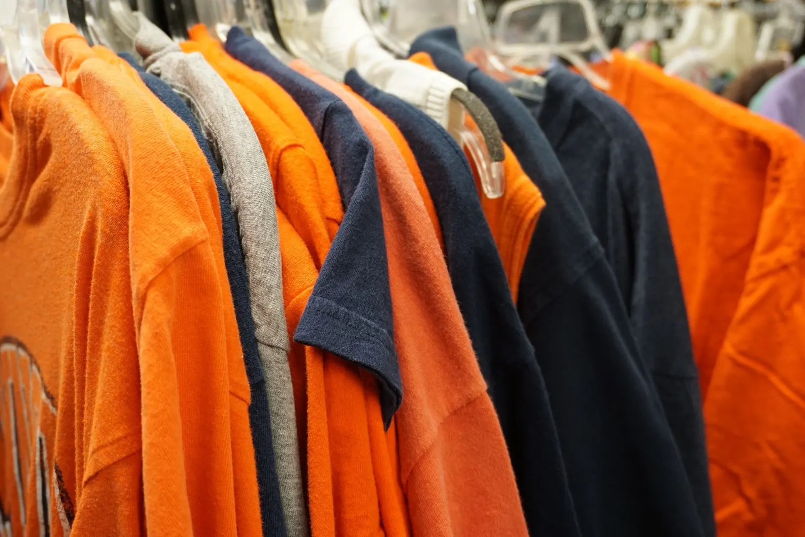 T-shirts organized on the racks